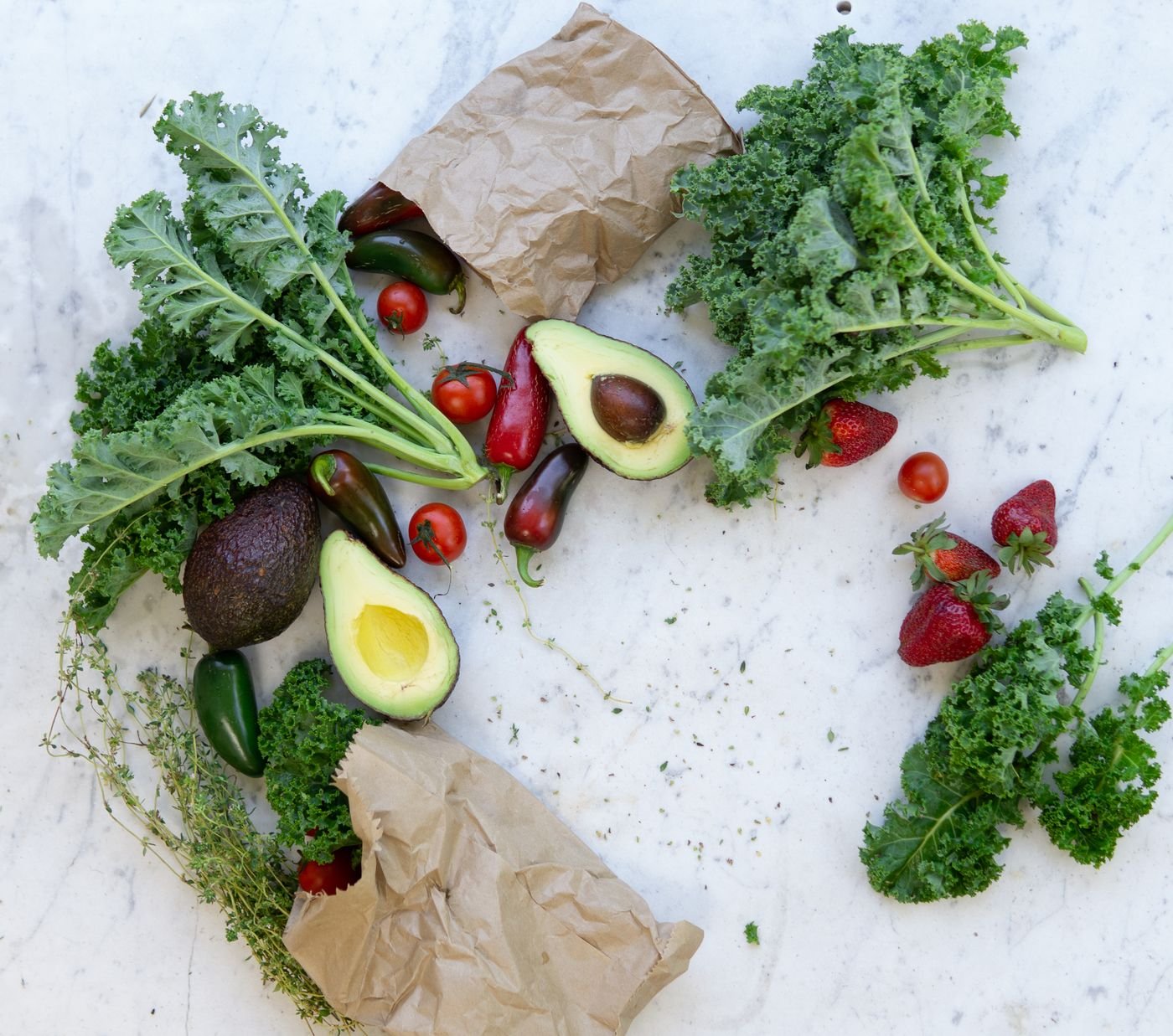 Colourful flat lay of fresh fruits and vegetables